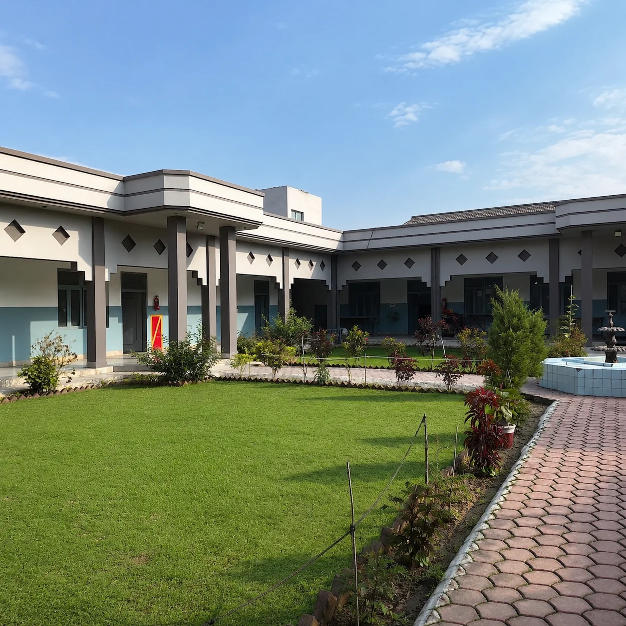 QST International in Sialkot: the building and its courtyard garden