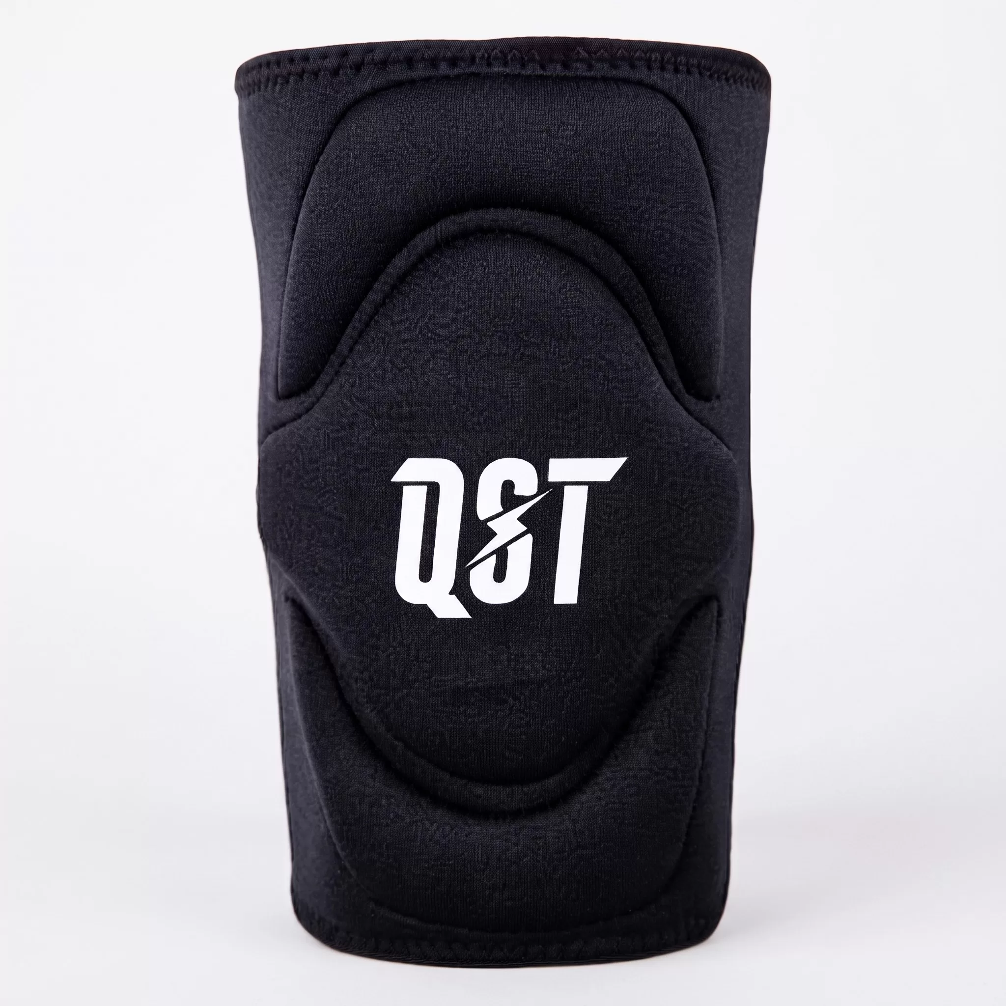 1 Black slip-on knee sleeve with padded cap and white QST logo on the front