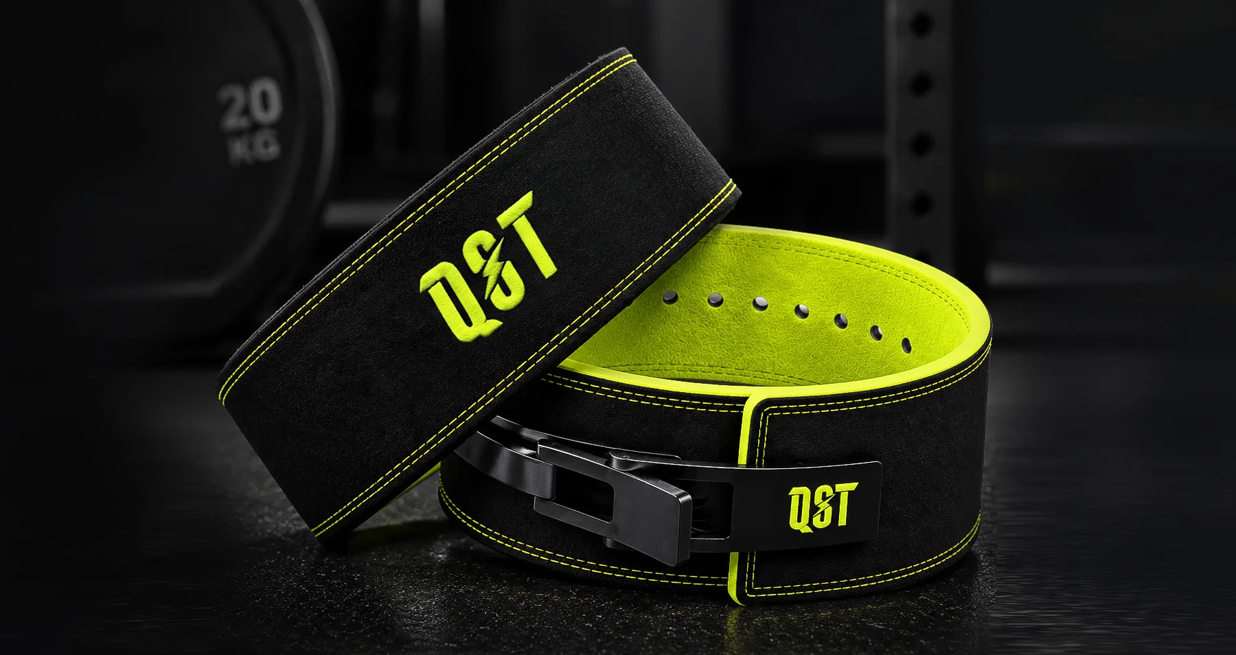 Black suede weightlifting lever belts with lime stitching and QST logo