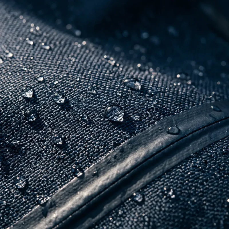 Close-up of water-repellent fabric with water droplets